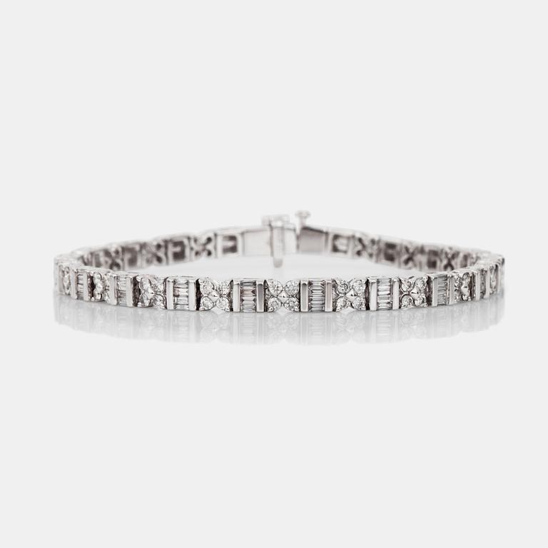 A brilliant- and baguette-cut diamond bracelet.