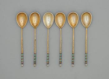 A set of six Russian 19th century silver-gilt and enamle tea-spoons, unidentified makers mark, St. Petersburg.