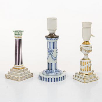 Royal Copenhagen, Two table lamps and a candlestick, Denmark, late 19th–early 20th century.