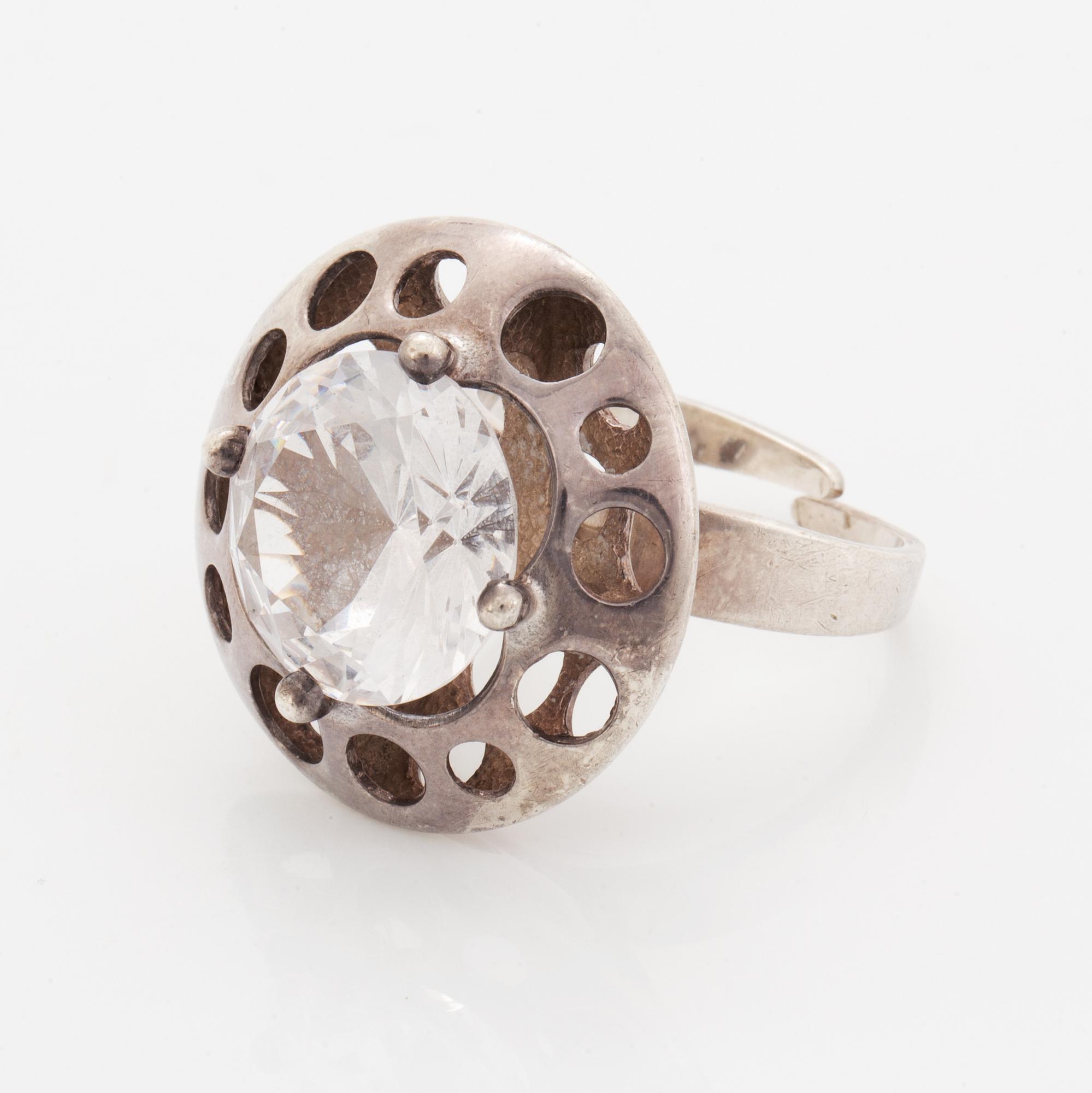 Bangle, ring and necklace, silver with colourless stones.