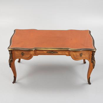 A French Louis XV-style parquetry and gilt bronze-mounted 'bureau plat', late 19th century.