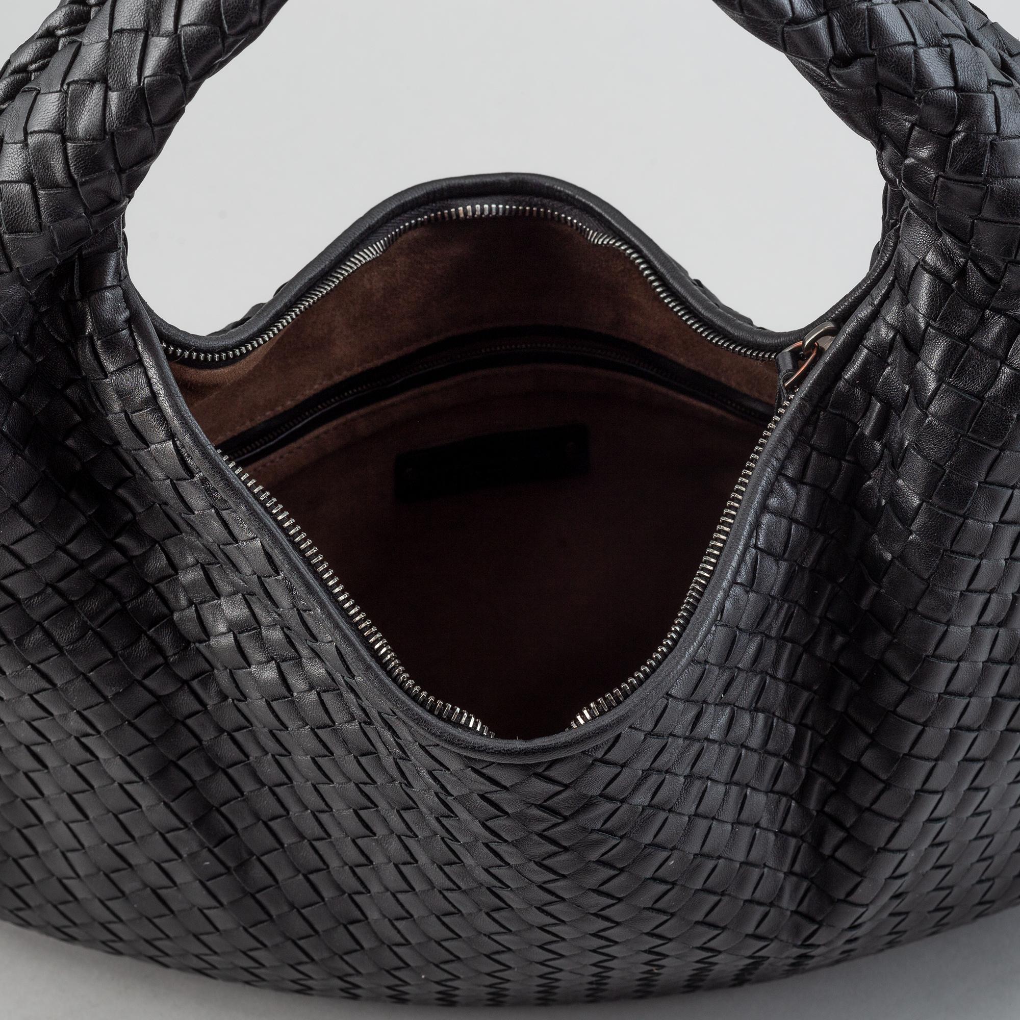 Bottega Veneta, black leather bag.