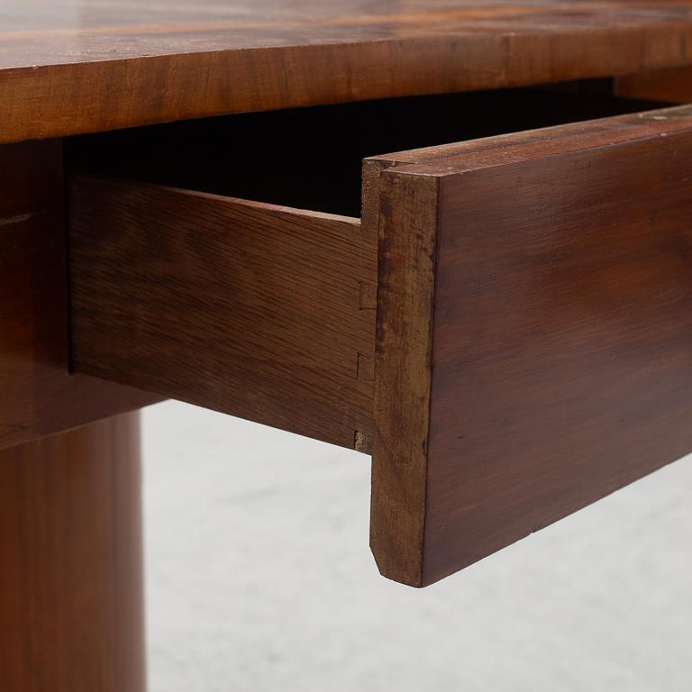 Table with folding leaves, Empire style, 19th century.