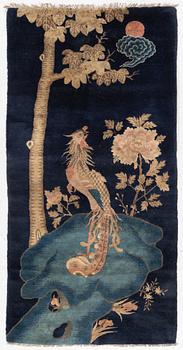 A Chinese ’phoenix rug’, 20th century, c. 181 x 93 cm.