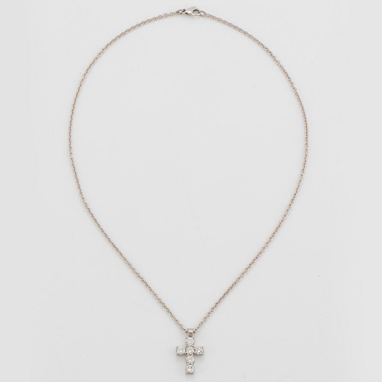 An 18K white gold cross pendant set with round brilliant-cut diamonds with a total weight of ca 1.20 cts.