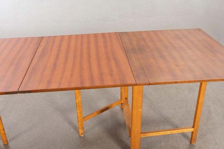 A teak and birch 'Maria Flap' gate leg table by Bruno Mathsson for Karl Mathsson.