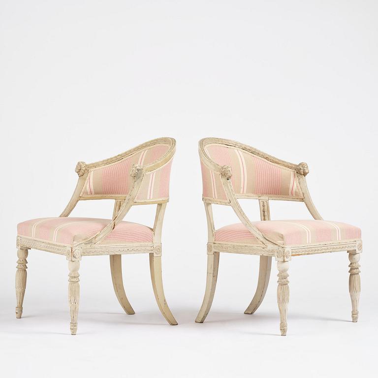 A pair of late Gustavian open.back armchairs, Stockholm, late 18th century.