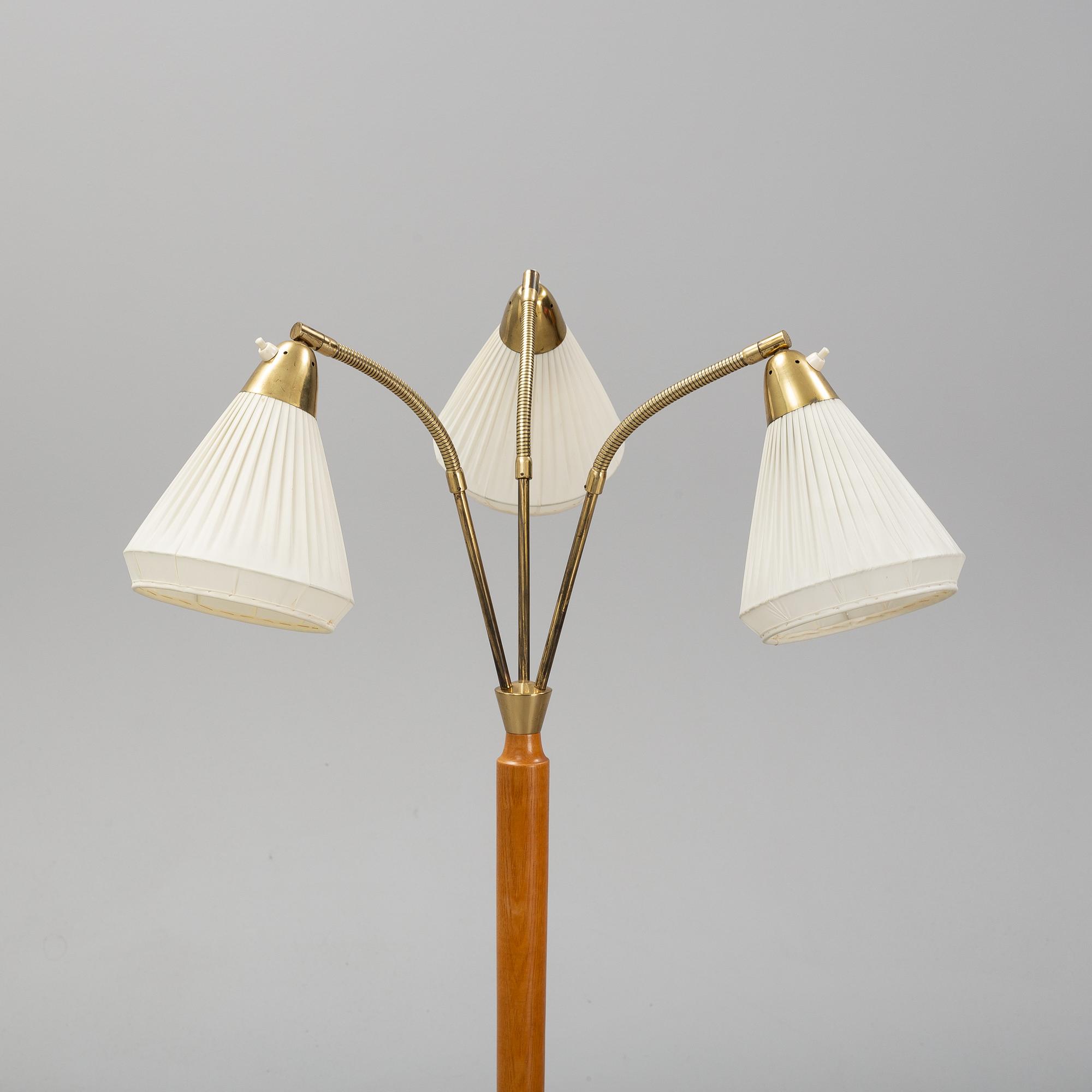 An elm floor light, mid 20th Century.