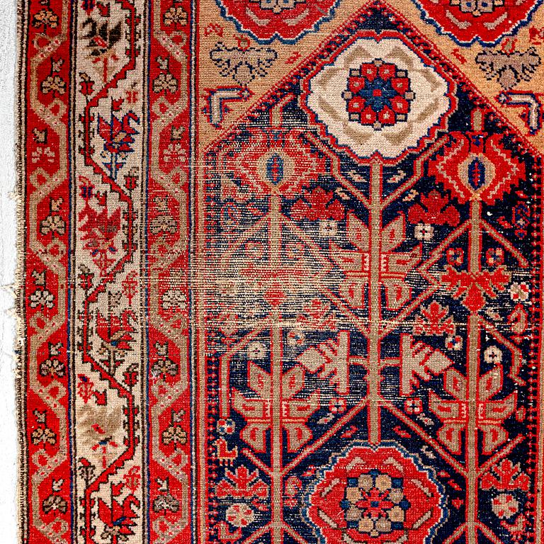 An antique Malajir runner ca 505x102 cm.
