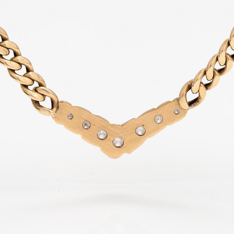A 14K gold necklace with diamonds ca. 0.46 ct in total. With certificate.