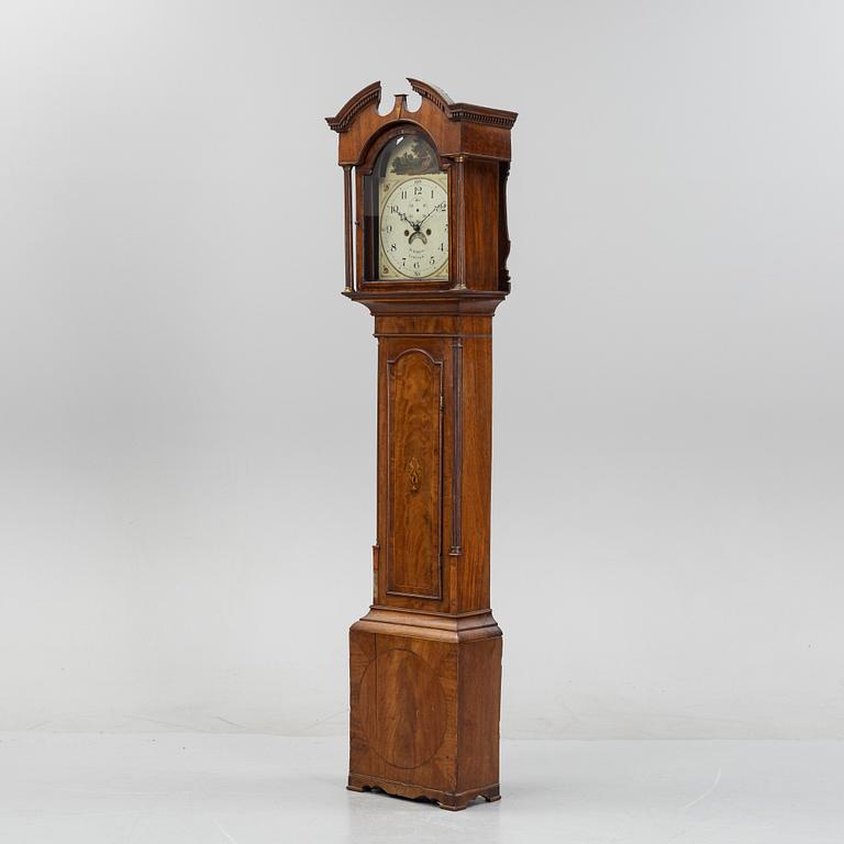 A mahognay long case clock from around the year 1800, H Bunyan Lincoln.