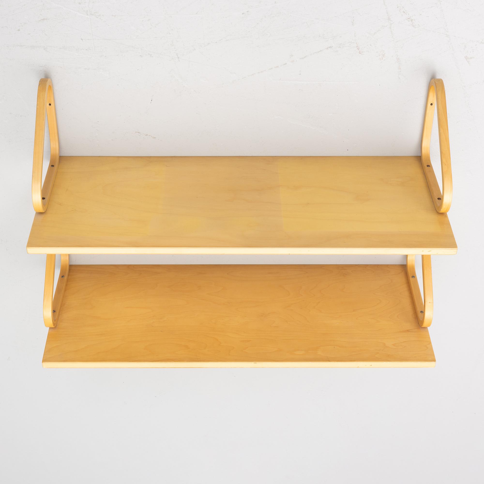 Alvar Aalto, a pair of wall shelves, model 112A, Artek, Finland, late 20th Century.