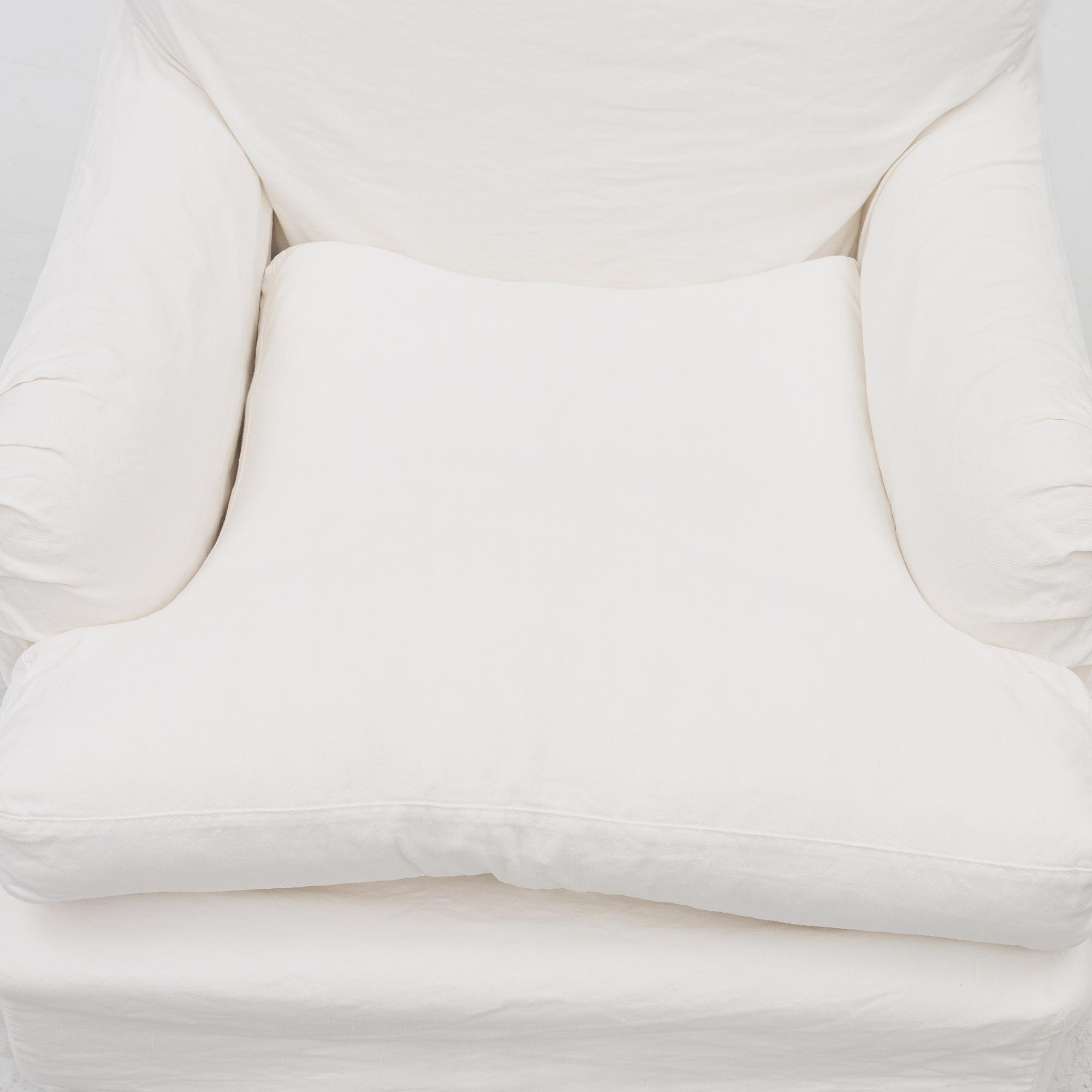 A Howard model armchair, contemporary.