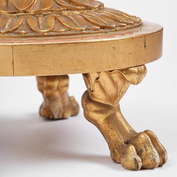 A pair of late Gustavian giltwood torchères by J. Frisk (master in Stockholm 1805-24).