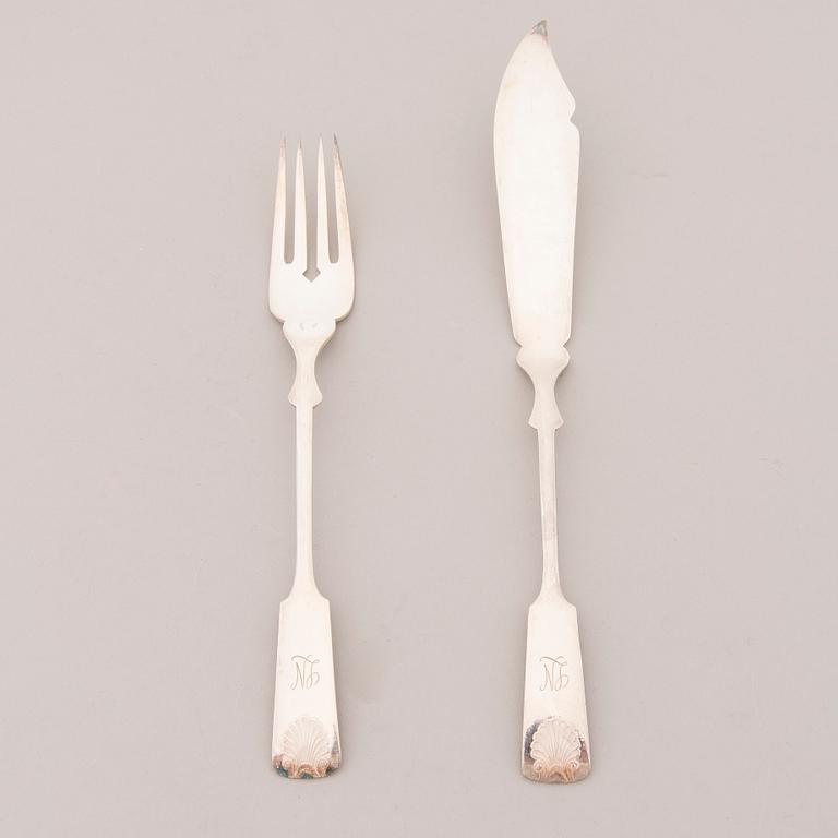 A set of 24 silver plate fish knives and forks with seashell decoration, Kultakeskus Oy, Finland 20th Century.