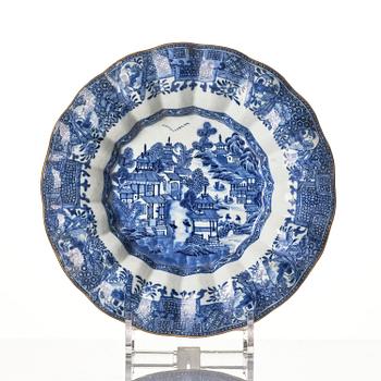 A Chinese blue and white 'pomegranate' tureen with cover and stand, Qing dynasty, Qianlong (1736-95).