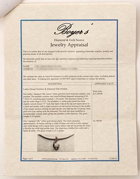 14K white gold solitaire diamond pendant.