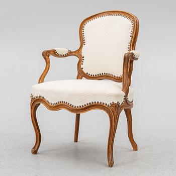 A French Louis XV oåpen back armchair, mid 18th century.