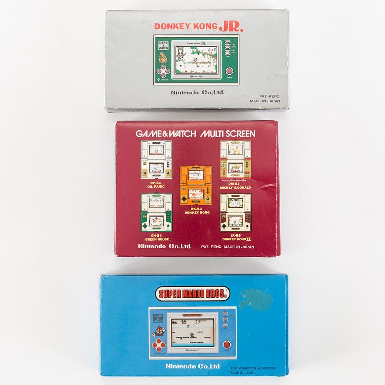 GAME & WATCH, "Donkey Kong jr", "Mario Bros" samt "Super Mario Bros" i förpackningar, Nintendo, 1982-1988.