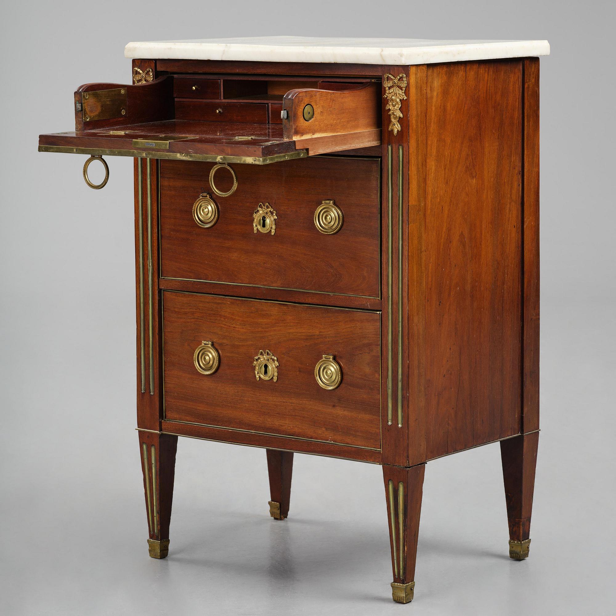 A late Gustavian mahogany commode, Stockholm, late 18th century.