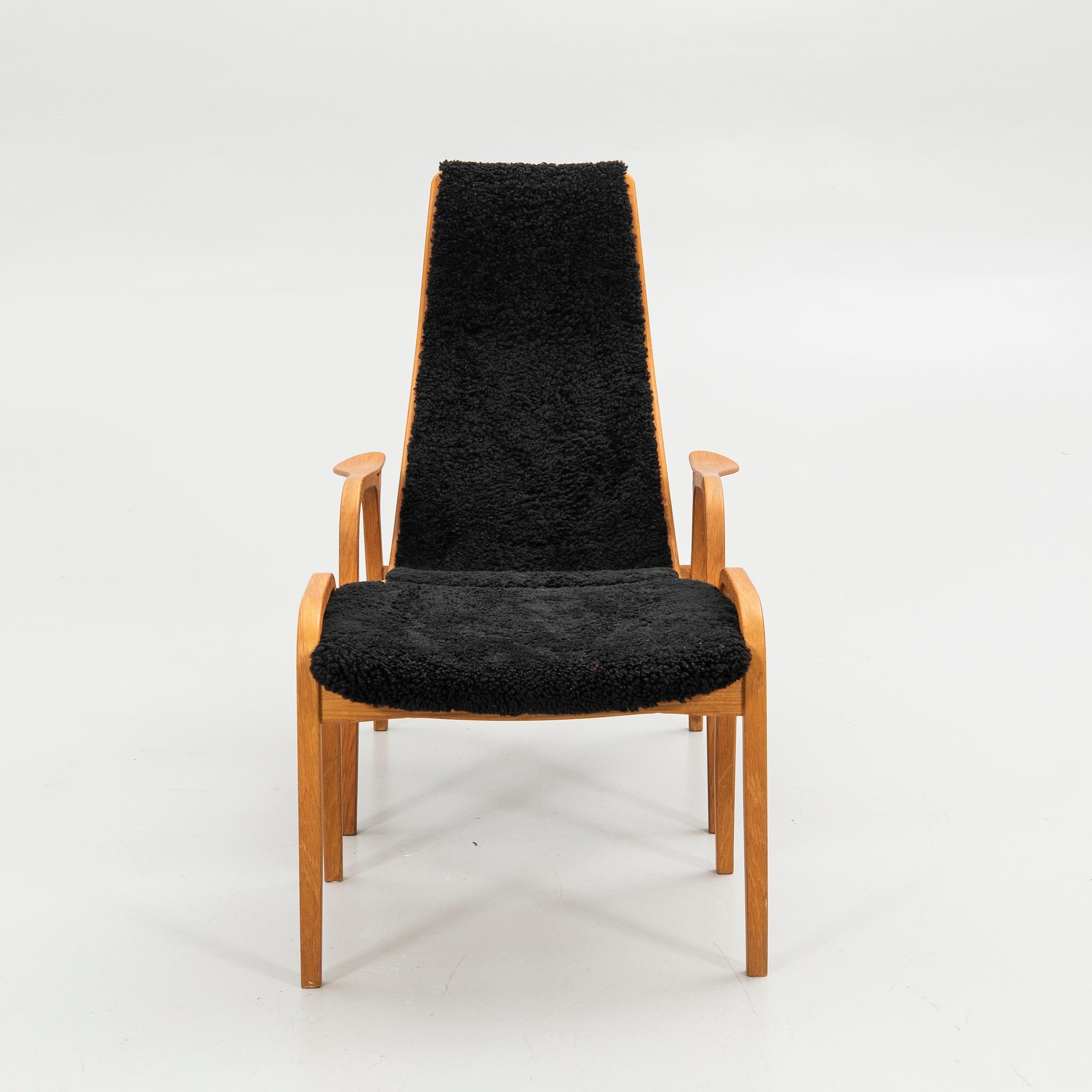 Yngve Ekström, armchair with footstool, "Lamino", Swedese, 2007.