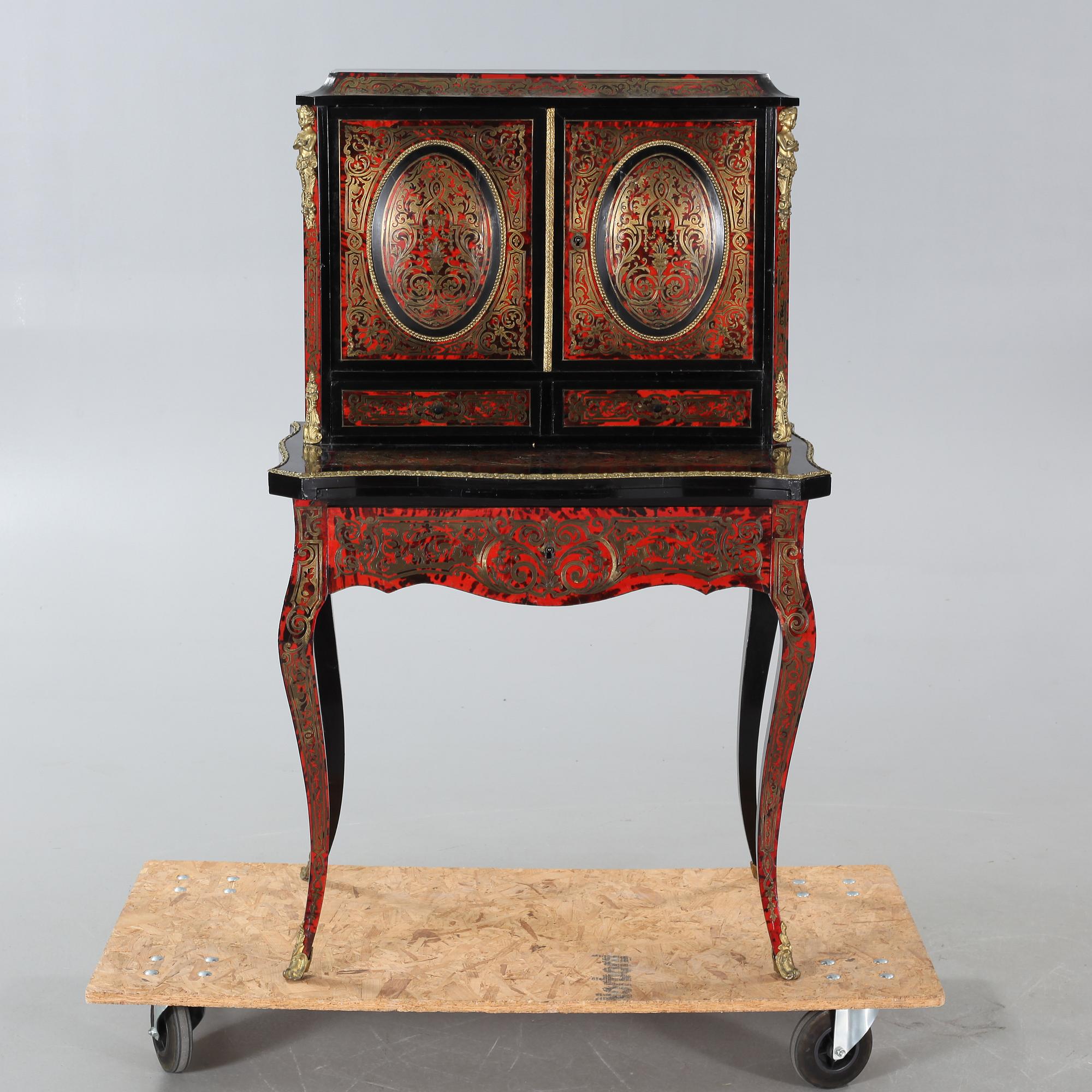 A Boulle style escritoire from the first half of the 20th century.