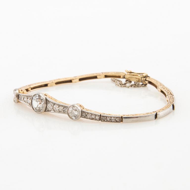 Bracelet 14K gold and platinum with round old-cut diamonds approximately 1.74 ct in total.