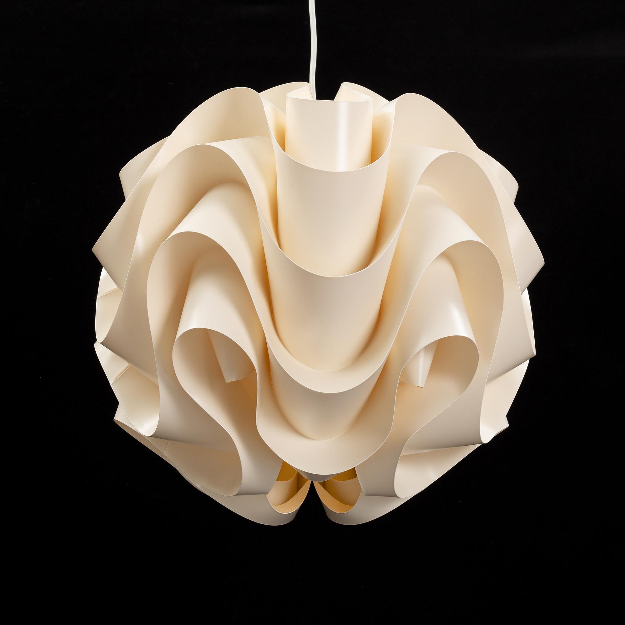 A ceiling, pendant lamp, '172' designed by Poul Christiansen in 1971 for Le Klint, Denmark.