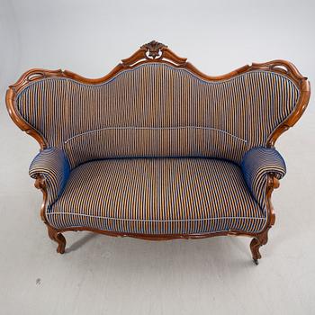 A Neo Rococo mahogany sofa later part of the 19th century.