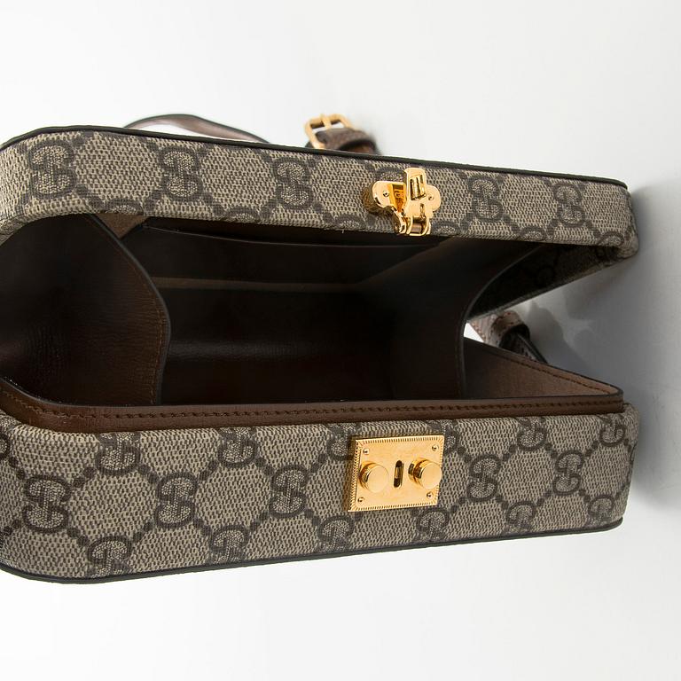 Gucci, "GG Supreme" laukku.