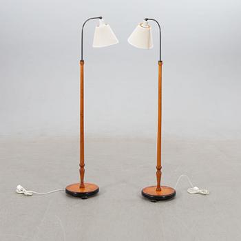 Floor lamps, a pair, 1940s.