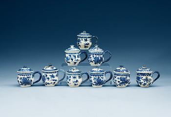 1593. A matched set of nine blue and white custard cups with covers, Qing dynasty, Qianlong (1736-95).