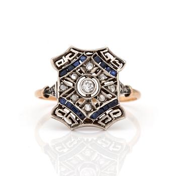 An Art Deco ring with old and rose-cut diamonds and carré and baguette-cut sapphires.