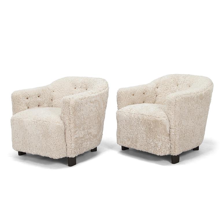 A pair of  1930s/40s. 'Continent' armchairs model 217, Asko, Finland.