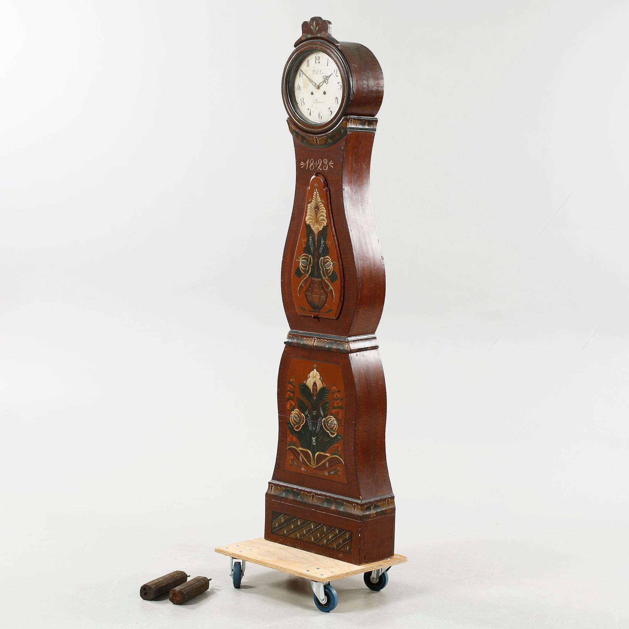 A grandfather clock dated 1823.