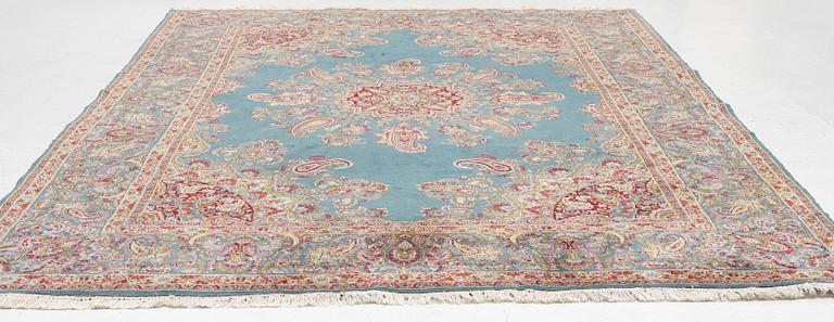 A Kirman carpet, c. 335 x 232 cm.