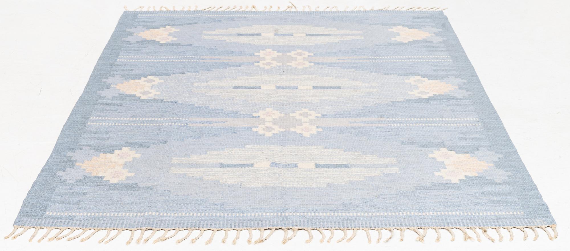 Ingegerd Silow, a carpet, c 235 x 166 cm, signed IS.