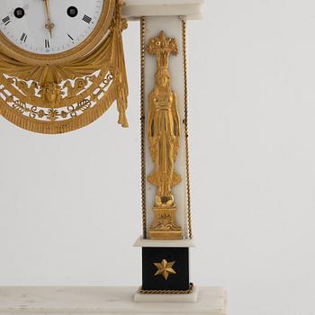 A French Louis XVI ormolu and marble portico clock, late 18th century.