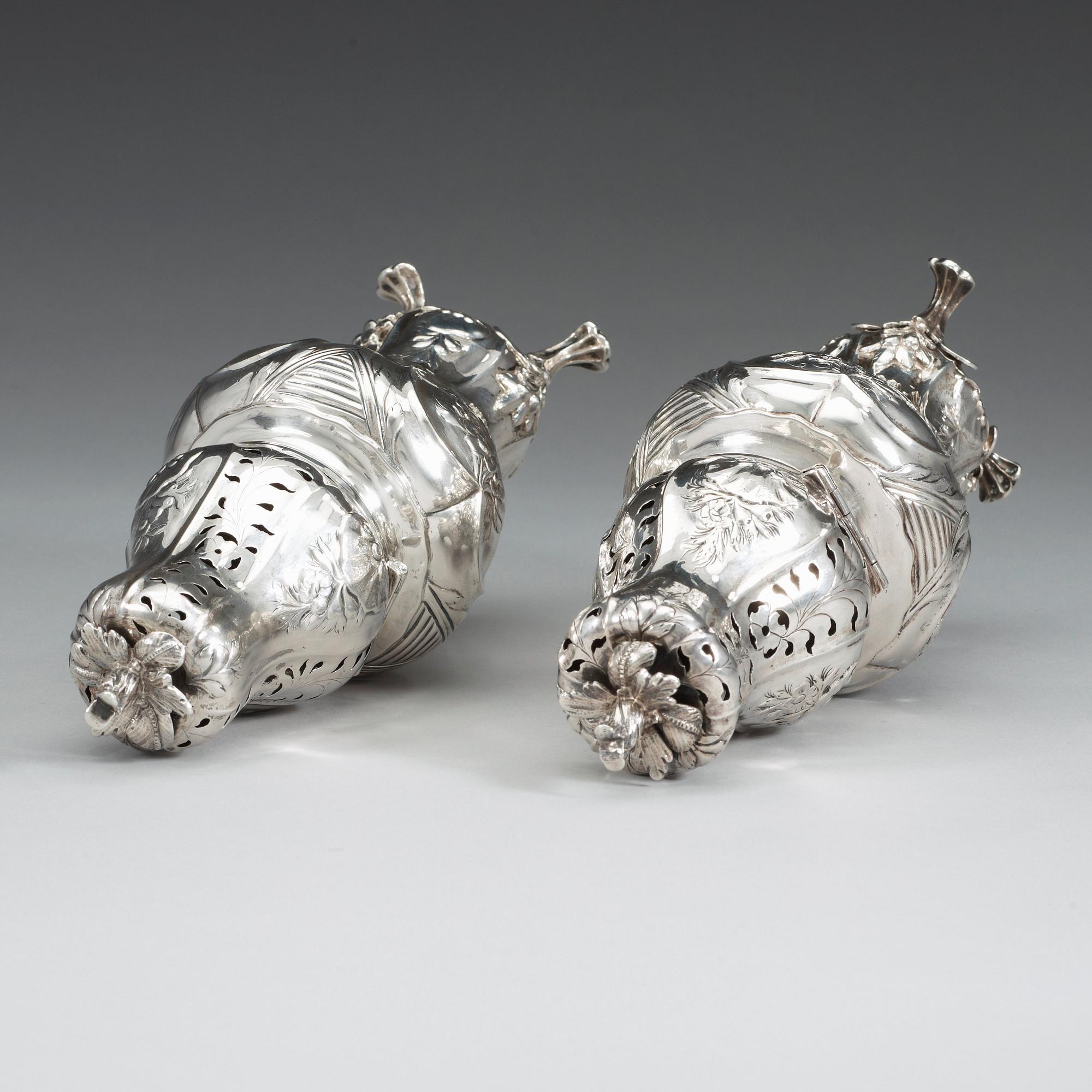 A Swedish 18th century silver sugar-casters, marked Lorentz Lindgren, Borås 1779, and one later copy with false marks.