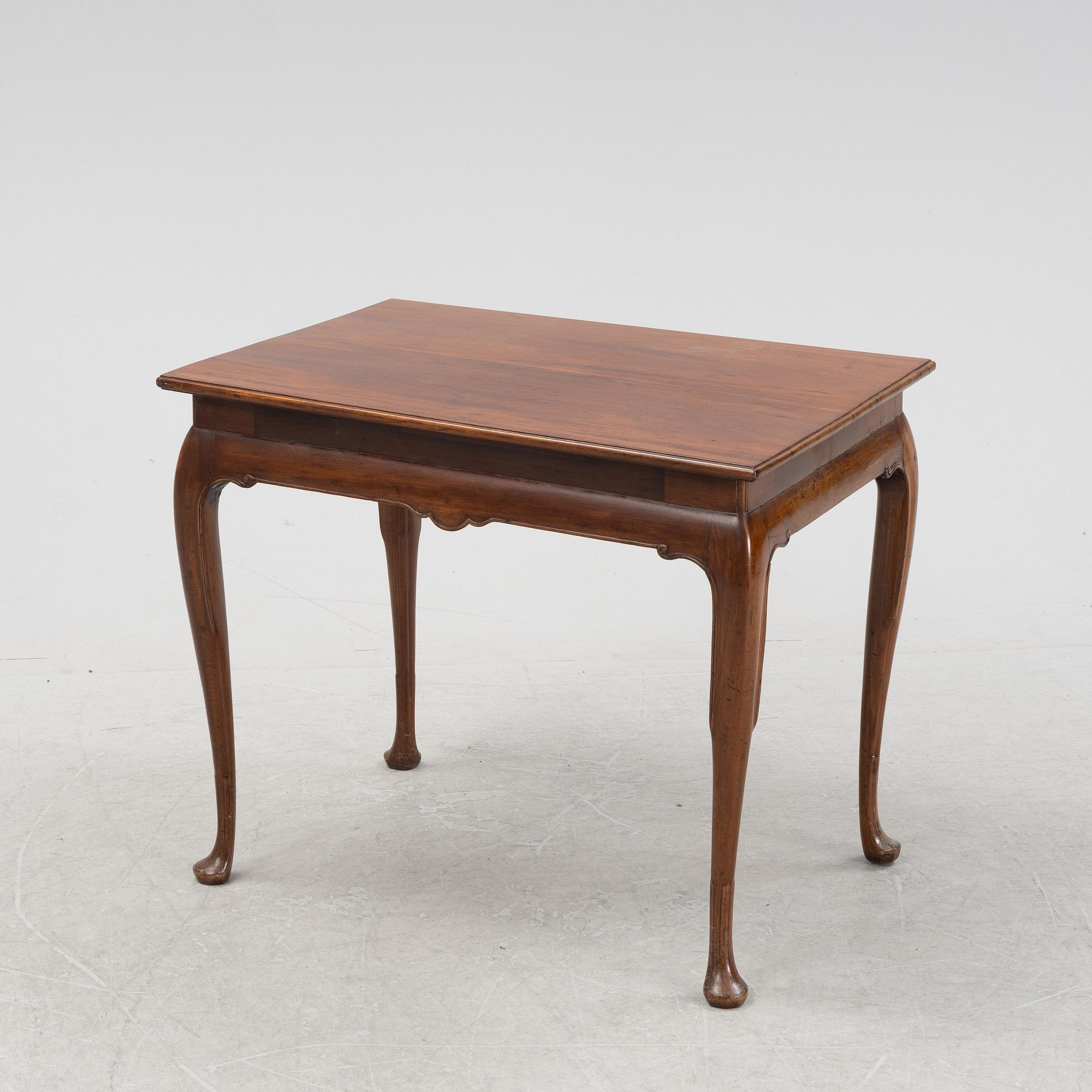 A composite mahogany table, 18th and 20th Century.