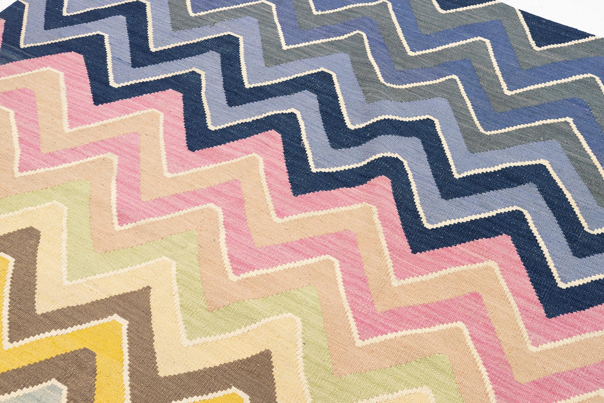 A Kelim rug, c. 240 x 175 cm.