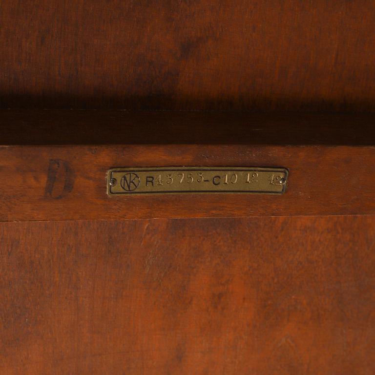 NORDISKA KOMPANIET, possibly be Carl Axel Acking, an oak plant stand from 1942.