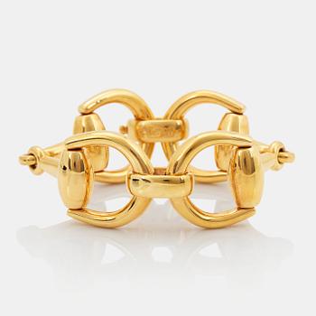 850. Gucci armband 18K guld.