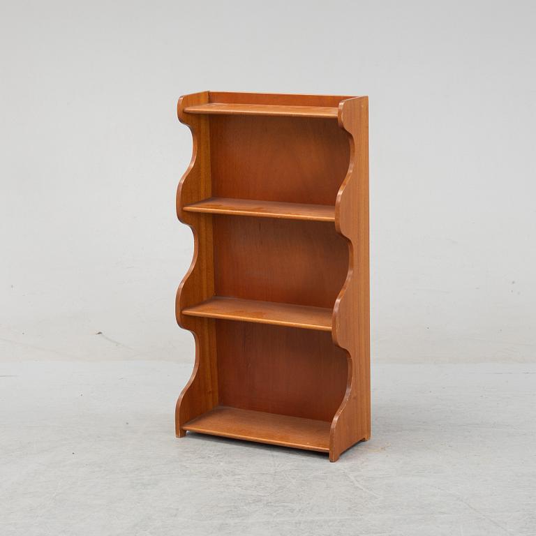 Josef Frank, a teak shelf, model 2221, Firma Svenskt Tenn.