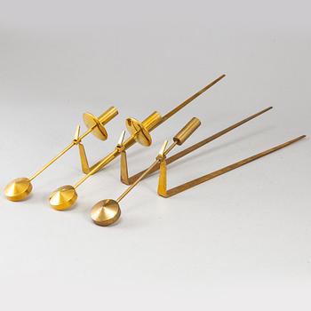 Three(2+1) brass wall sconces by Pierre Forsell, "Pendeln", Skultuna.