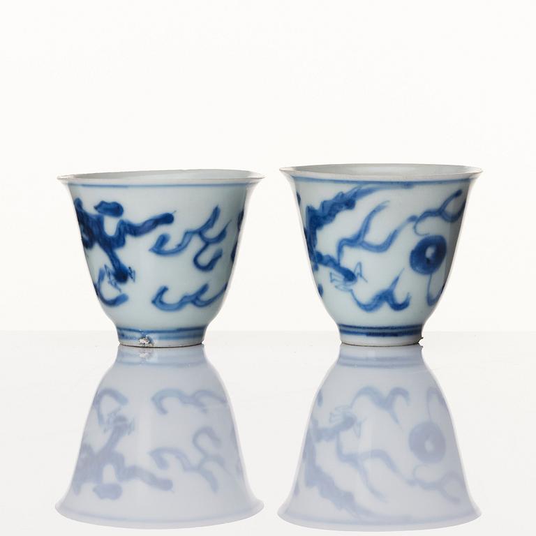 A set of two blue and white wine cups, Ming dynasty, Transition/Chongzhen (1628-44).