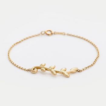 Tiffany & Co, Paloma Picasso, an 18K gold "Olive Leaf" bracelet.