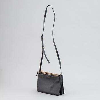 Céline, a black leather 'Trio Bag'.