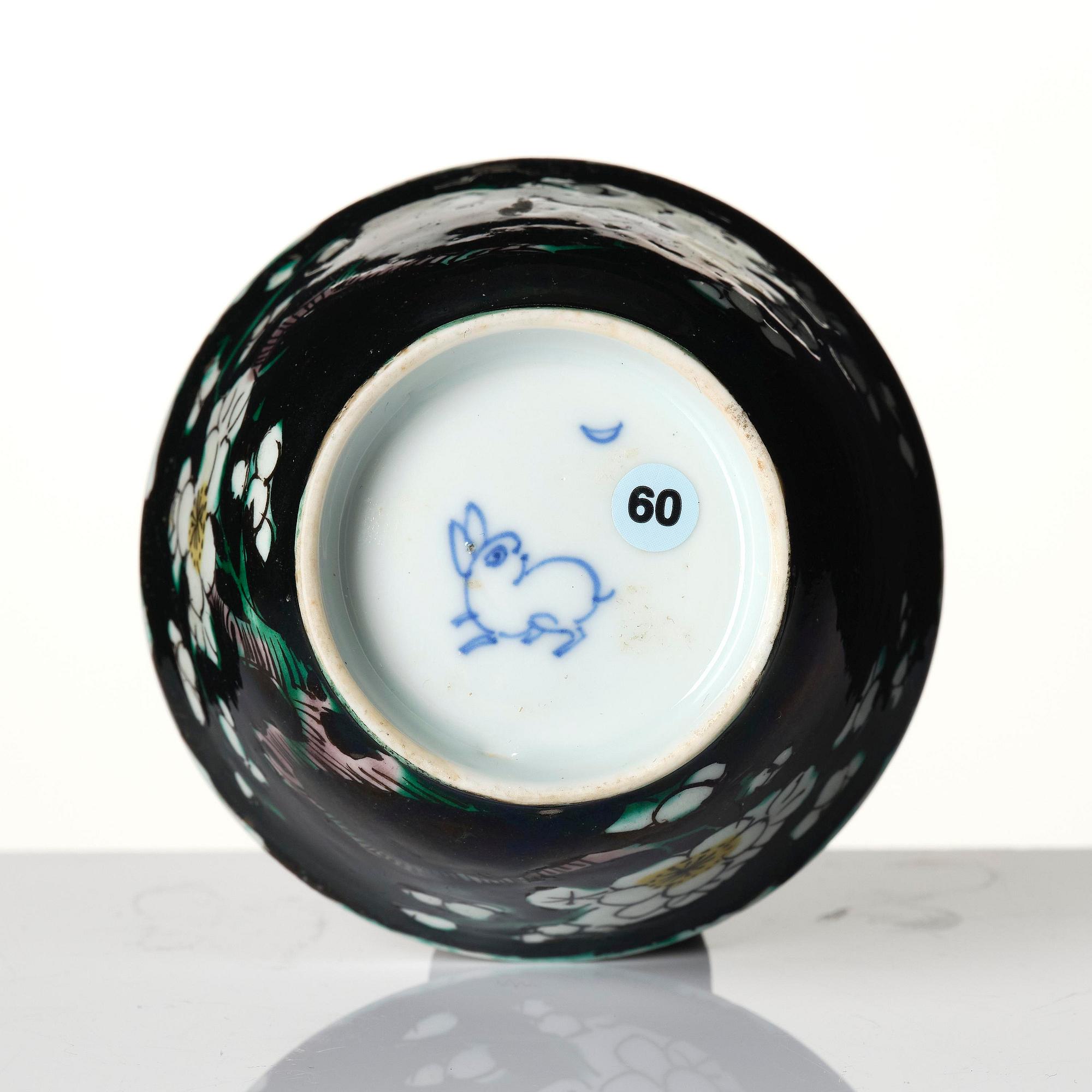 A famille noire cup with stand, Qing dynasty, Kangxi (1662-1722).