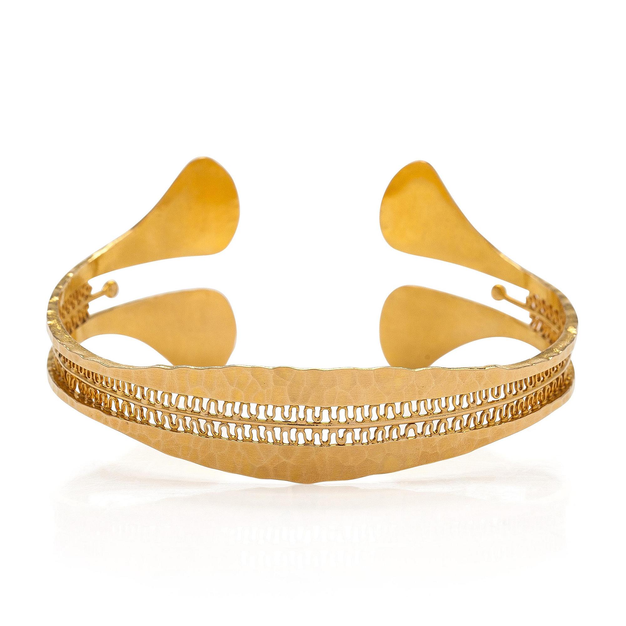 Tapio Wirkkala, rannekoru, "Viikinkiranne", 18K kultaa, 1960-luku.